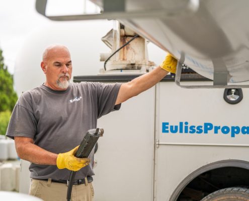 Euliss service technician making a propane delivery
