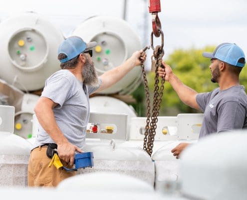 Euliss technicians with propane tanks