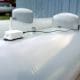 A propane tank with a monitor attatched to the top.