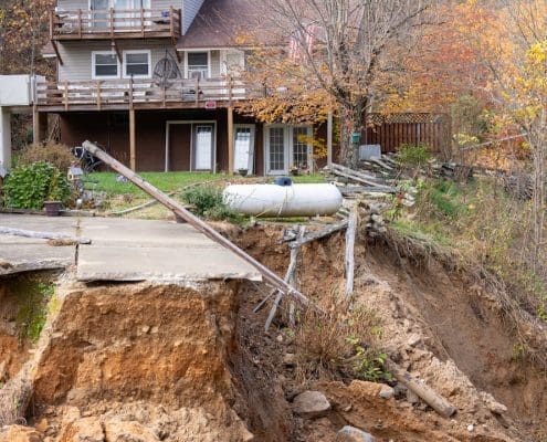 Propane tank alongside a devastated road in Bakersville, NC.