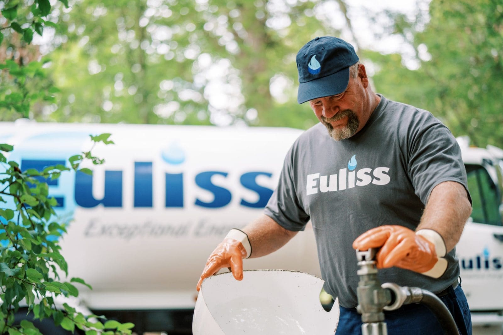 Euliss employee by a propane tank